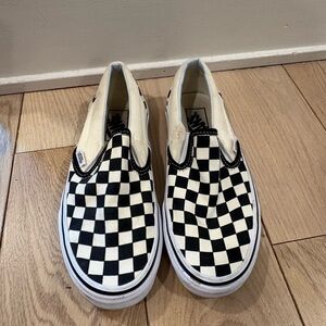 Vans Black and White Checkerboard Slip-Ons